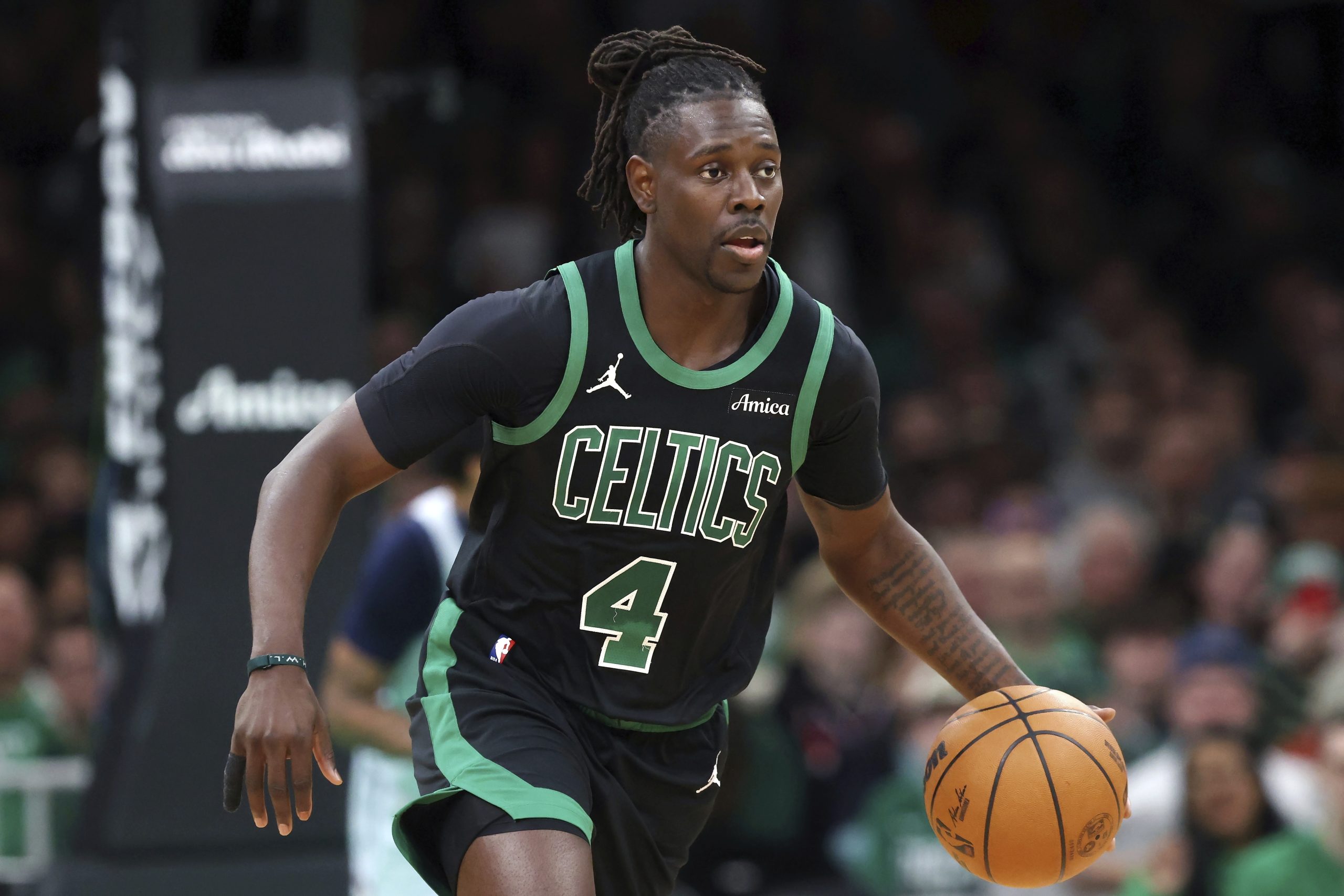 Jrue Holiday being sent from Celtics to Trail Blazers for Anfernee Simons and picks, AP source says
