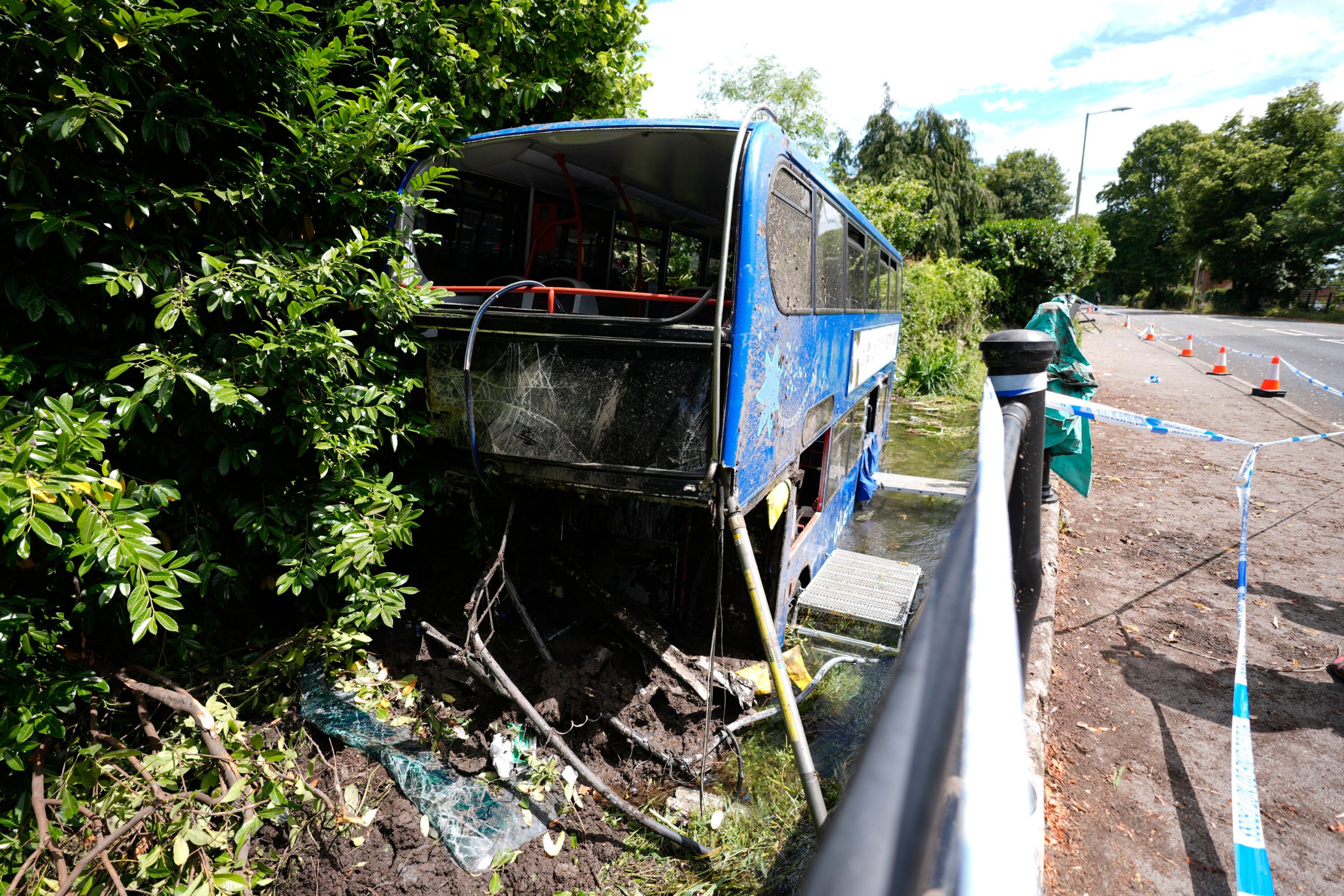 Double-decker bus carrying students plunges into English river in ‘terrifying’ crash