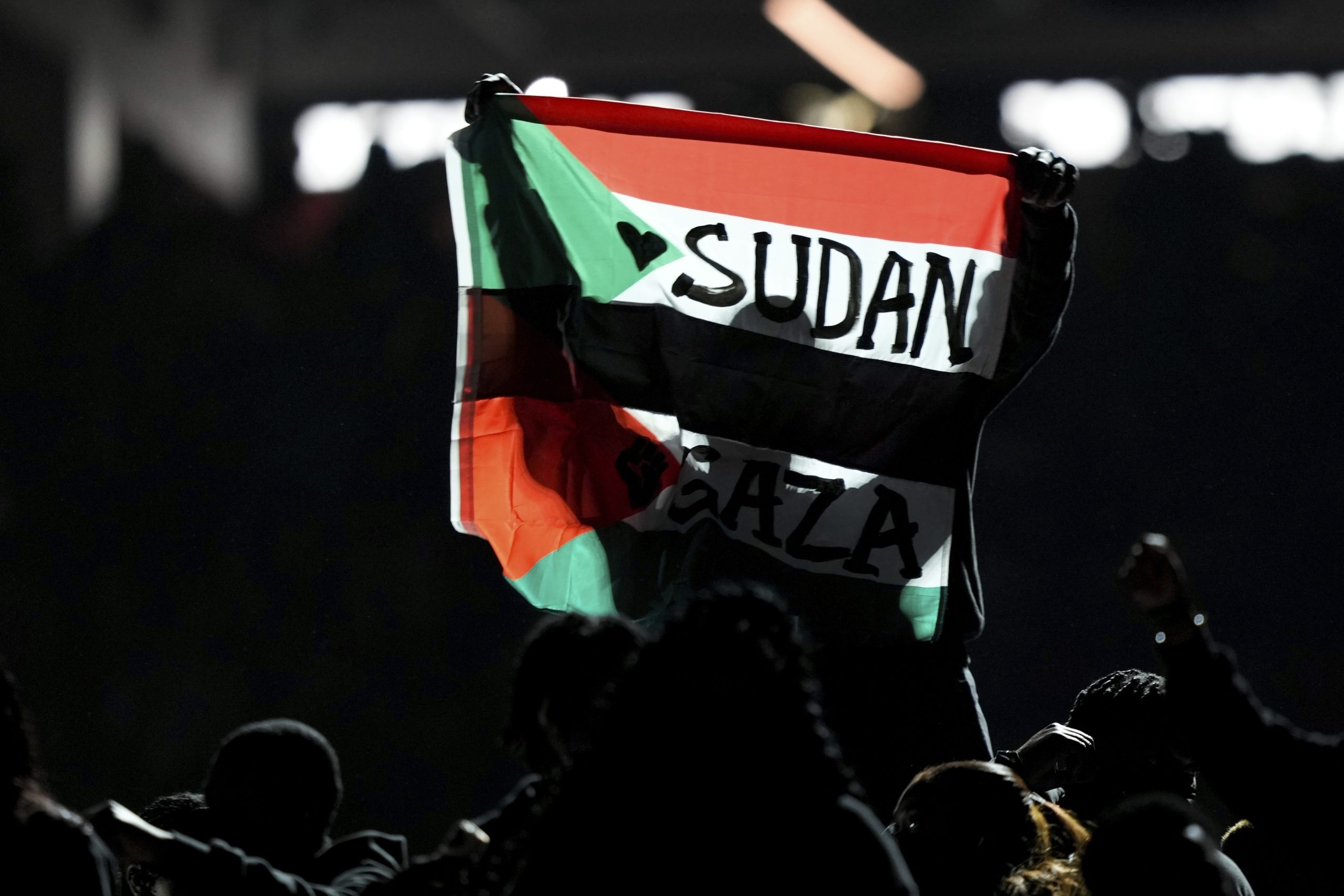 Super Bowl halftime performer charged for running on field with ‘Sudan and Free Gaza’ flag
