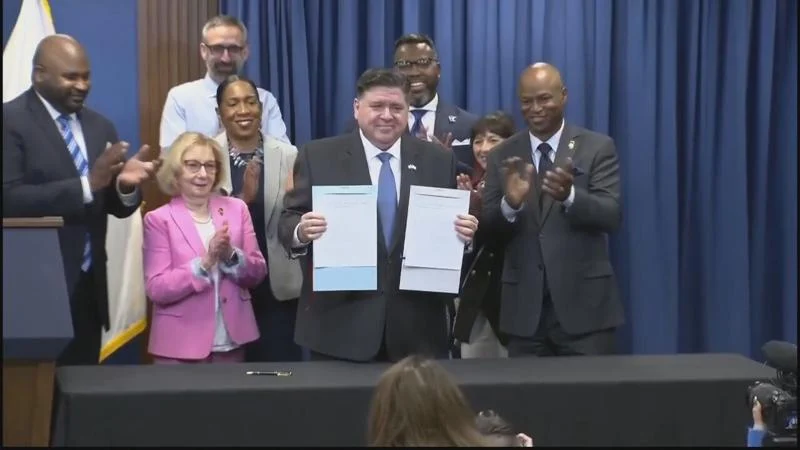 WATCH: Enacting largest IL budget ever with tax increases, Pritzker criticizes Trump