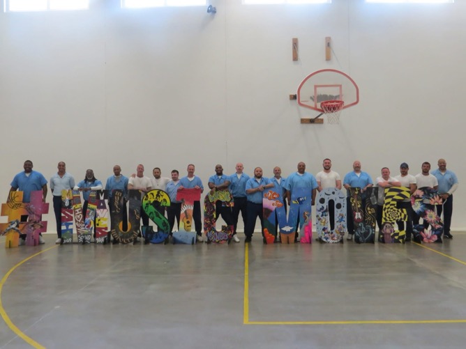 Kewanee Re-Entry Center Crafts Vibrant Sign for Levitt Amp Galva Music Series