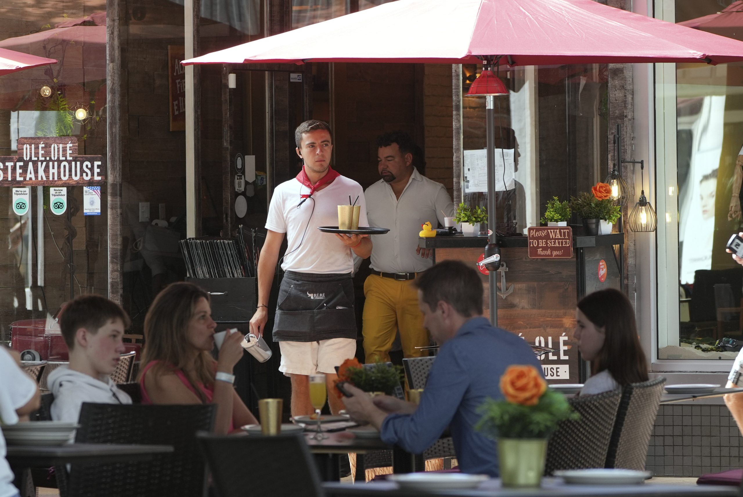 What to know — and what isn’t known yet — about US tax deductions for tips and overtime pay