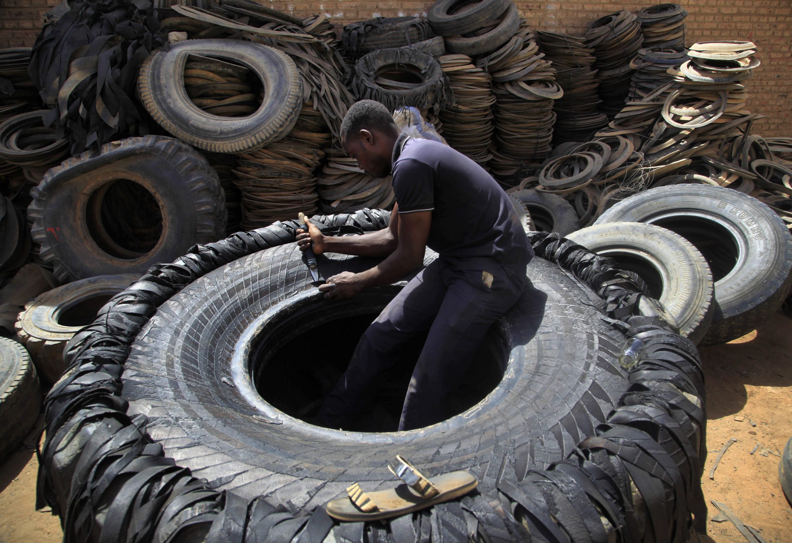 As the going gets tough in South Sudan, some artisans offer cheap footwear made from rubber tires