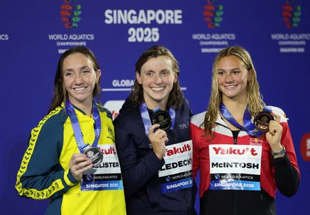 Swimming-Ledecky sees off McIntosh in epic 800 freestyle showdown at world championships