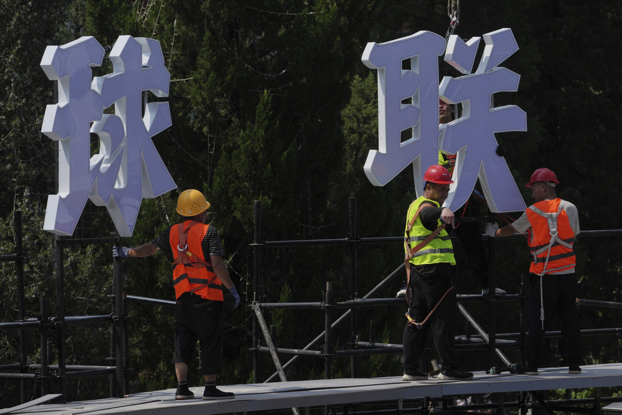 China’s economy lags in July under pressure from tariffs and a weak property market