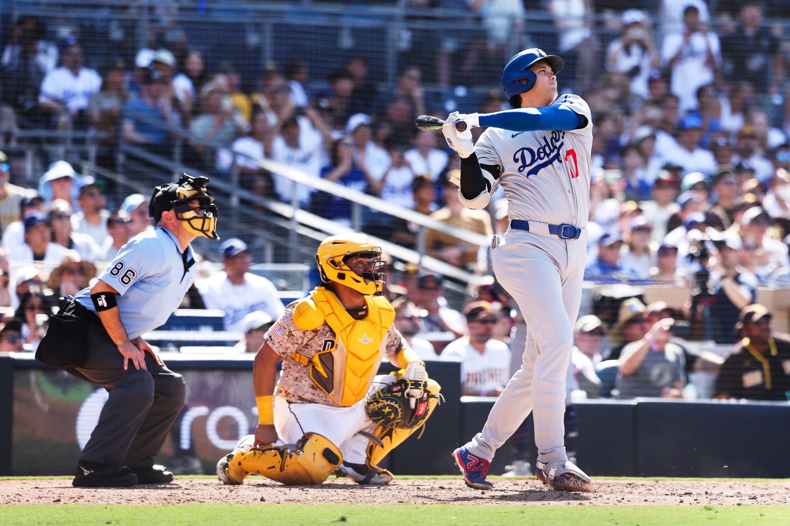 Shohei Ohtani high-fives a heckler after his homer to cap Dodgers’ comeback rivalry win over Padres