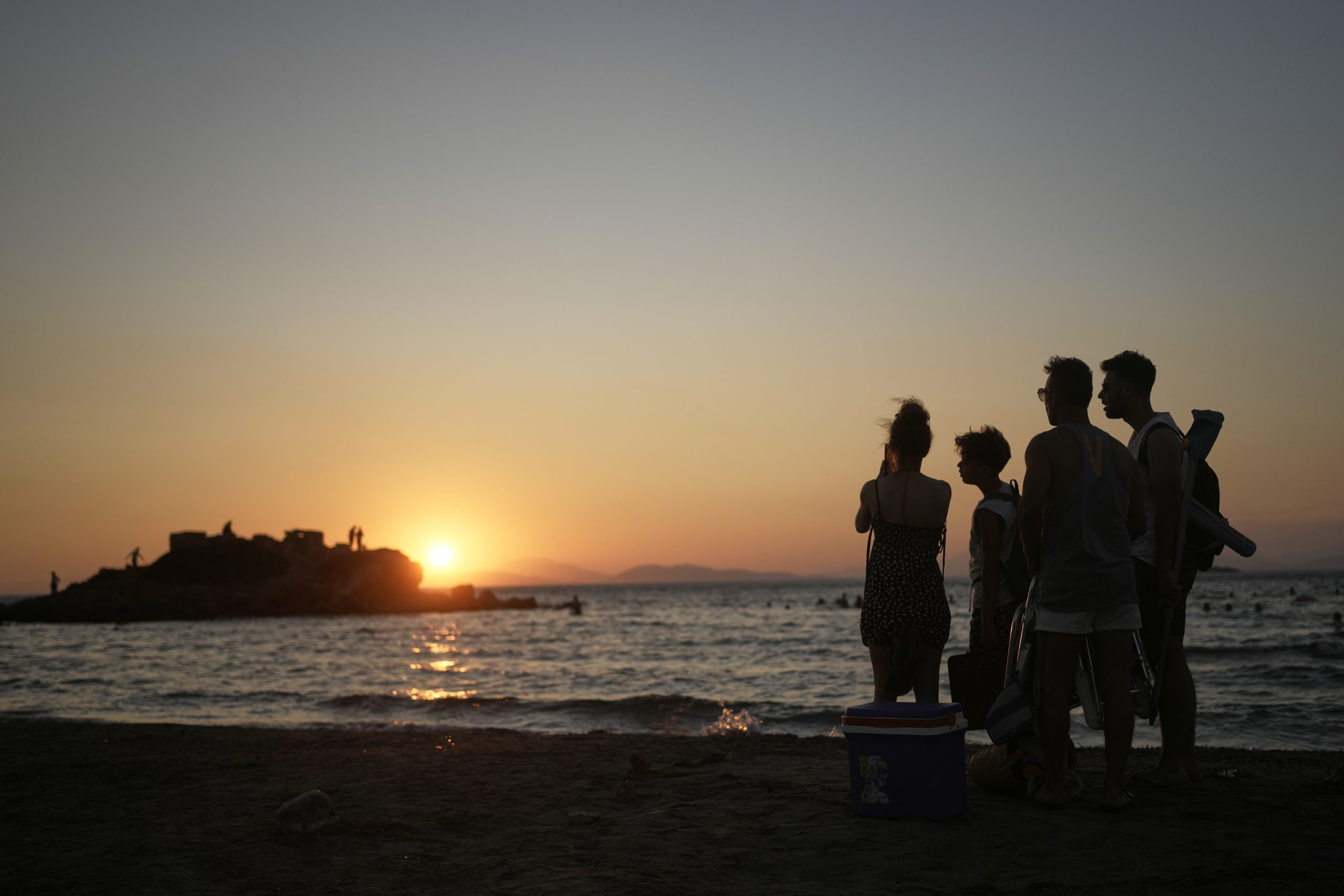 Beach on a budget: Greeks settle for day trips, priced out of iconic destinations