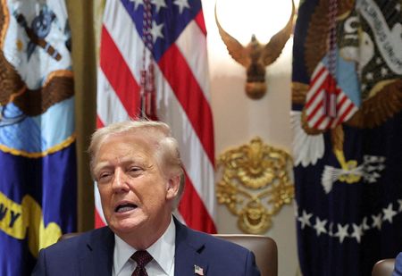 Analysis-Seeking more power, Trump uses firings to test presidential limits