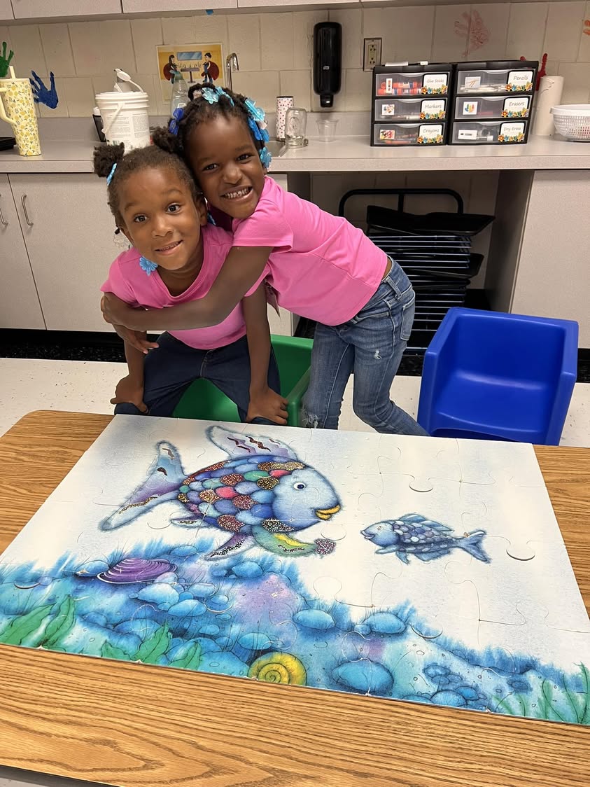 Mary and Elizabeth worked hard putting a puzzle together today in kindergarten.