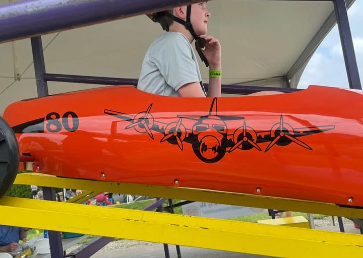 This car was an entry in the Quincy Soapbox Derby. Bomber Student Athlete Alumni Ray Wilson designed and entered it in h…