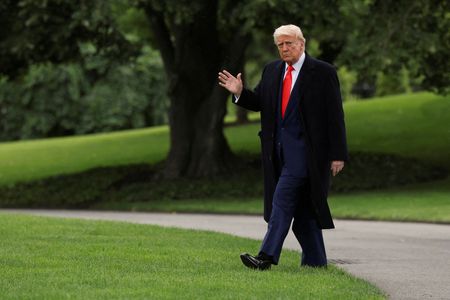 Factbox-From coins to miners: Trump family’s crypto playbook