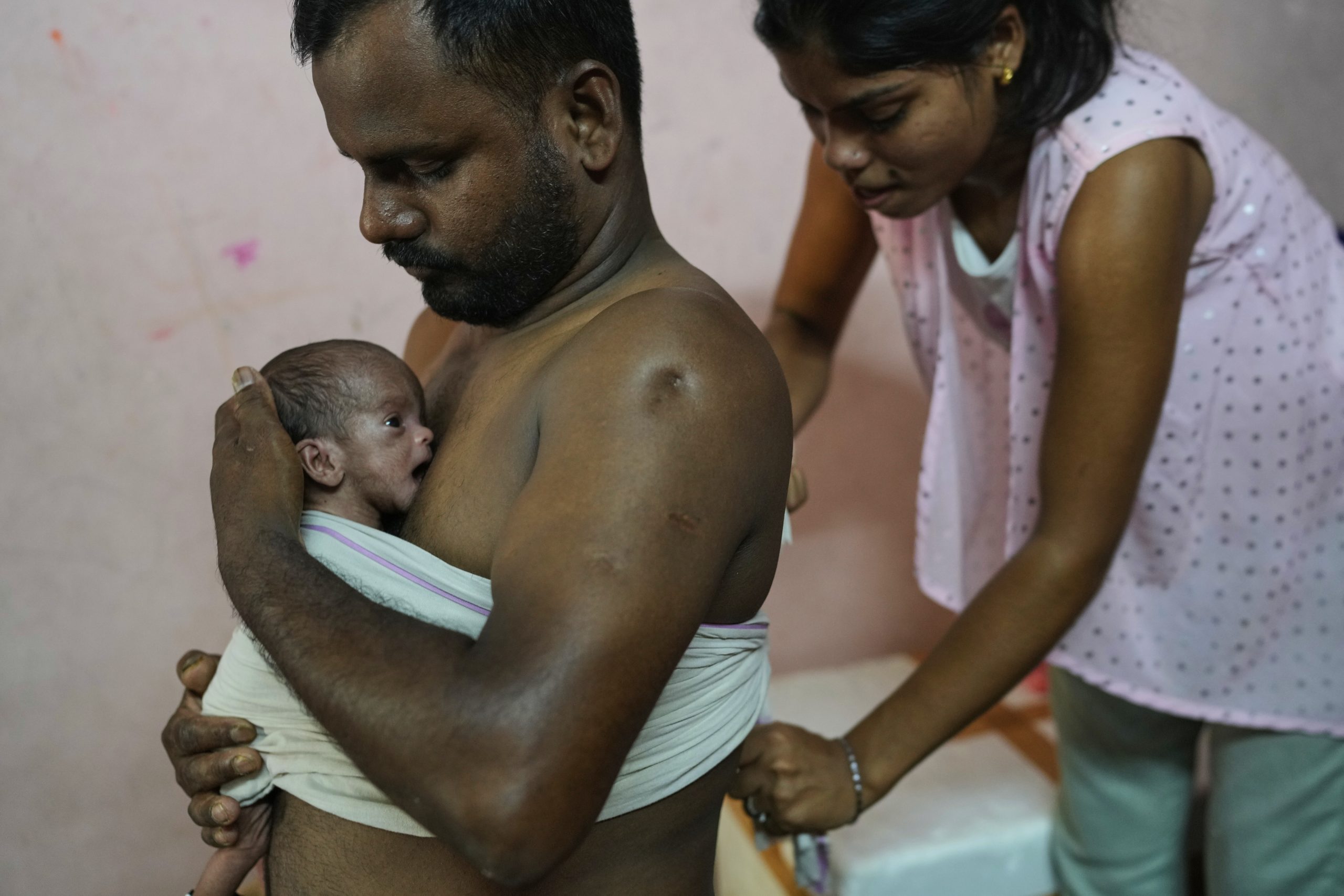 Photos show newborn caregiving programs helping ease parenting in India
