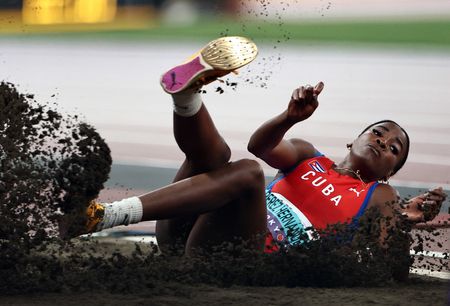 Athletics-Perez Hernandez caps great year with triple jump gold