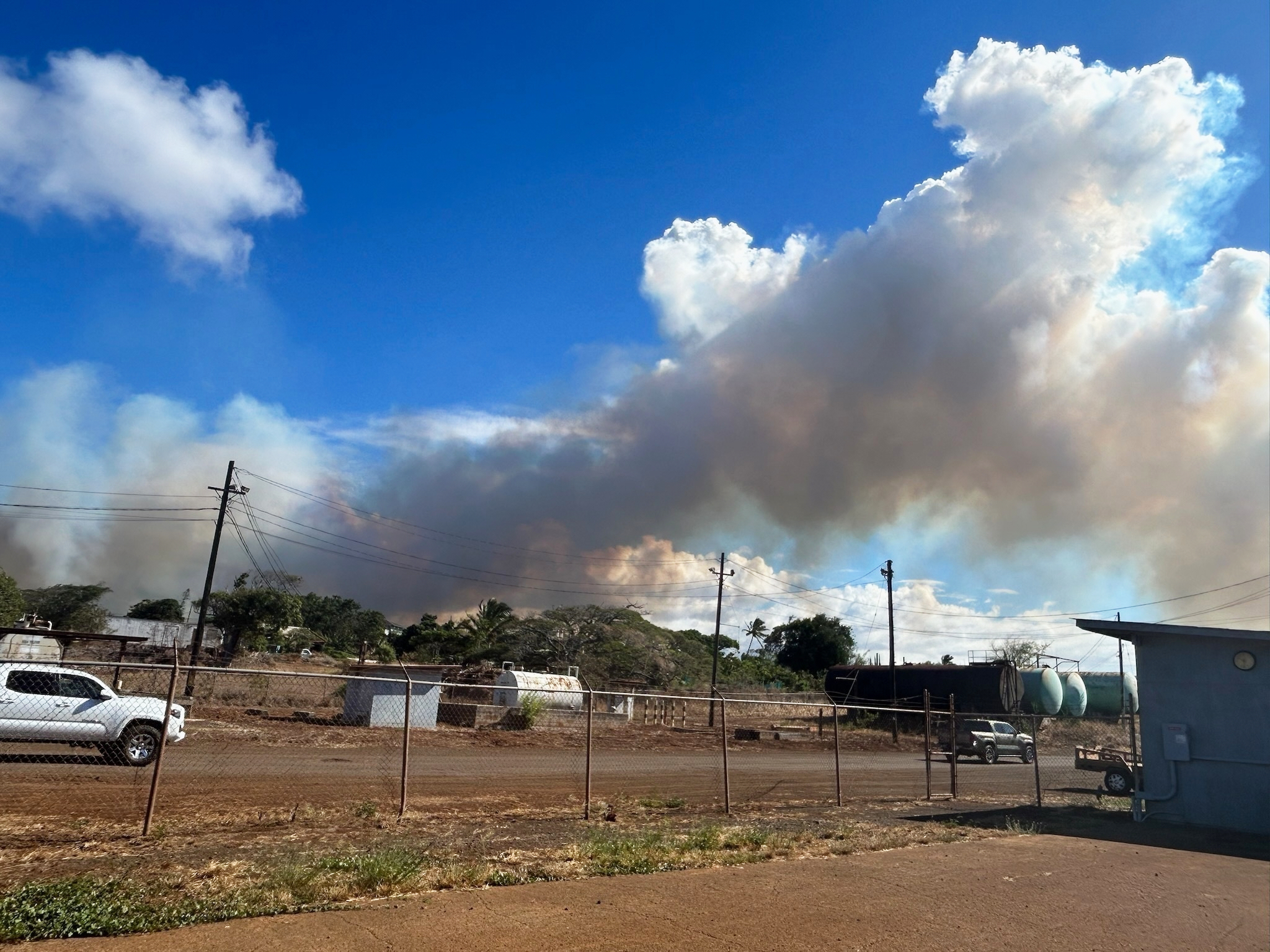 Maui officials sound emergency sirens and evacuate residents as wildfire threatens north shore town