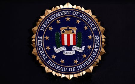 FBI fires agents pictured kneeling during racial justice protest in 2020