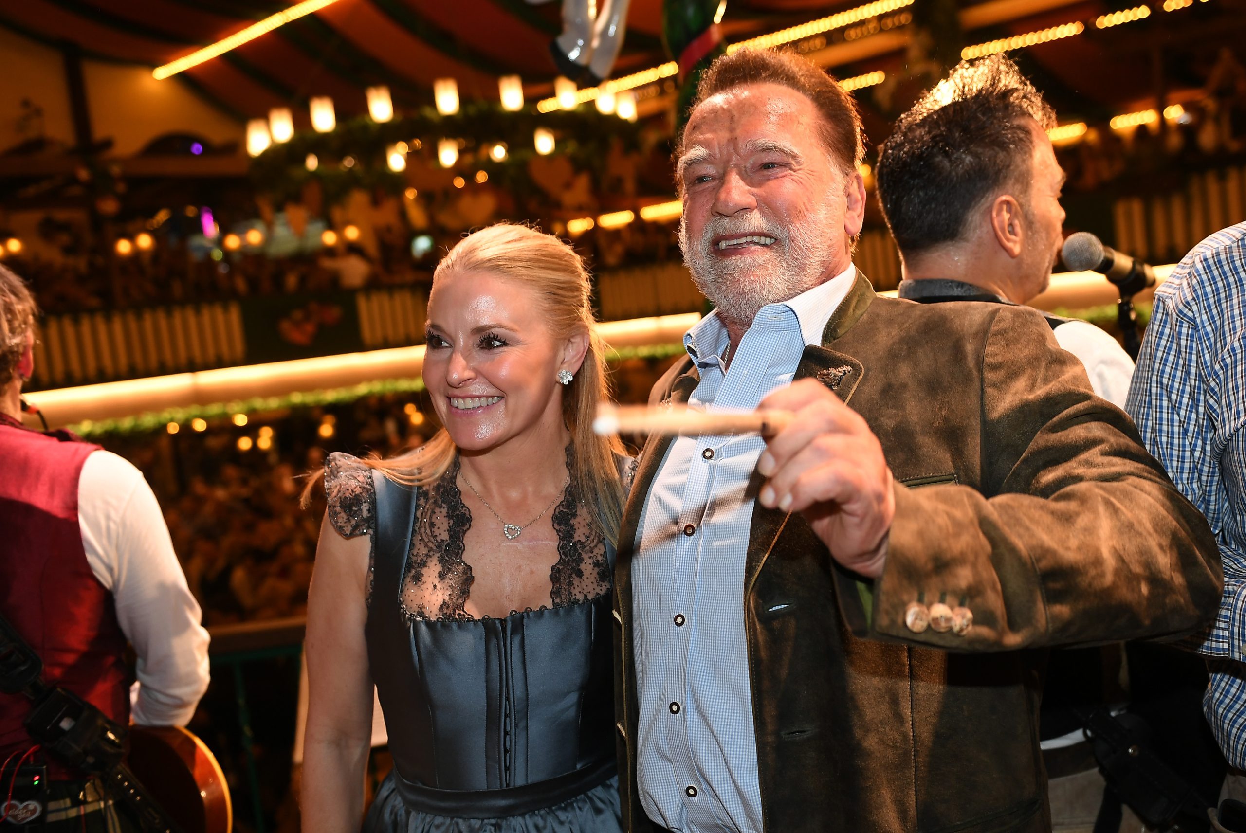 Schwarzenegger directs a band in a beer tent at Munich’s Oktoberfest