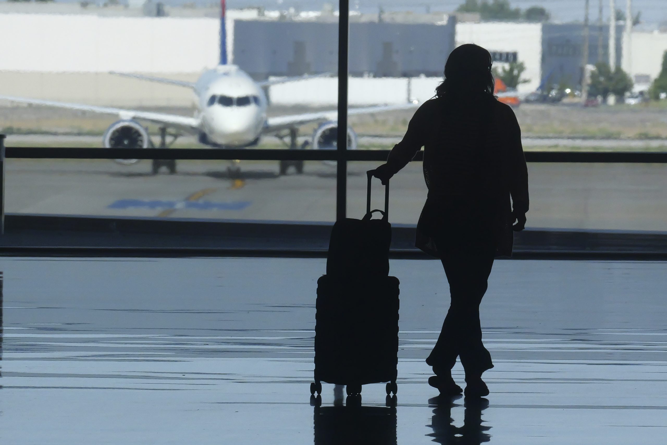 Some air travelers bothered by their flight’s emissions turn to carbon offsets. Do they work?