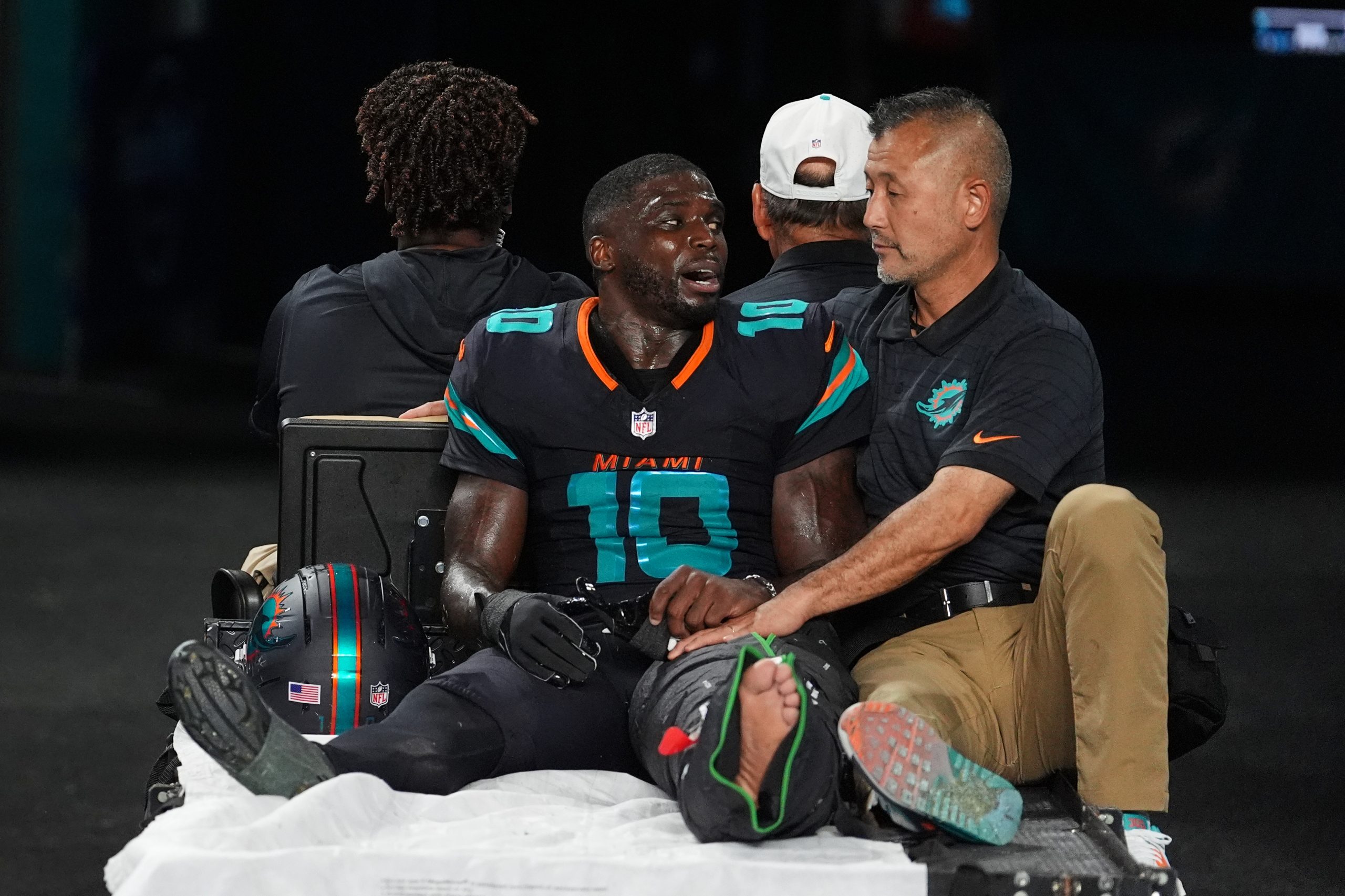 Dolphins’ Tyreek Hill carted off field and taken to hospital with serious left leg injury