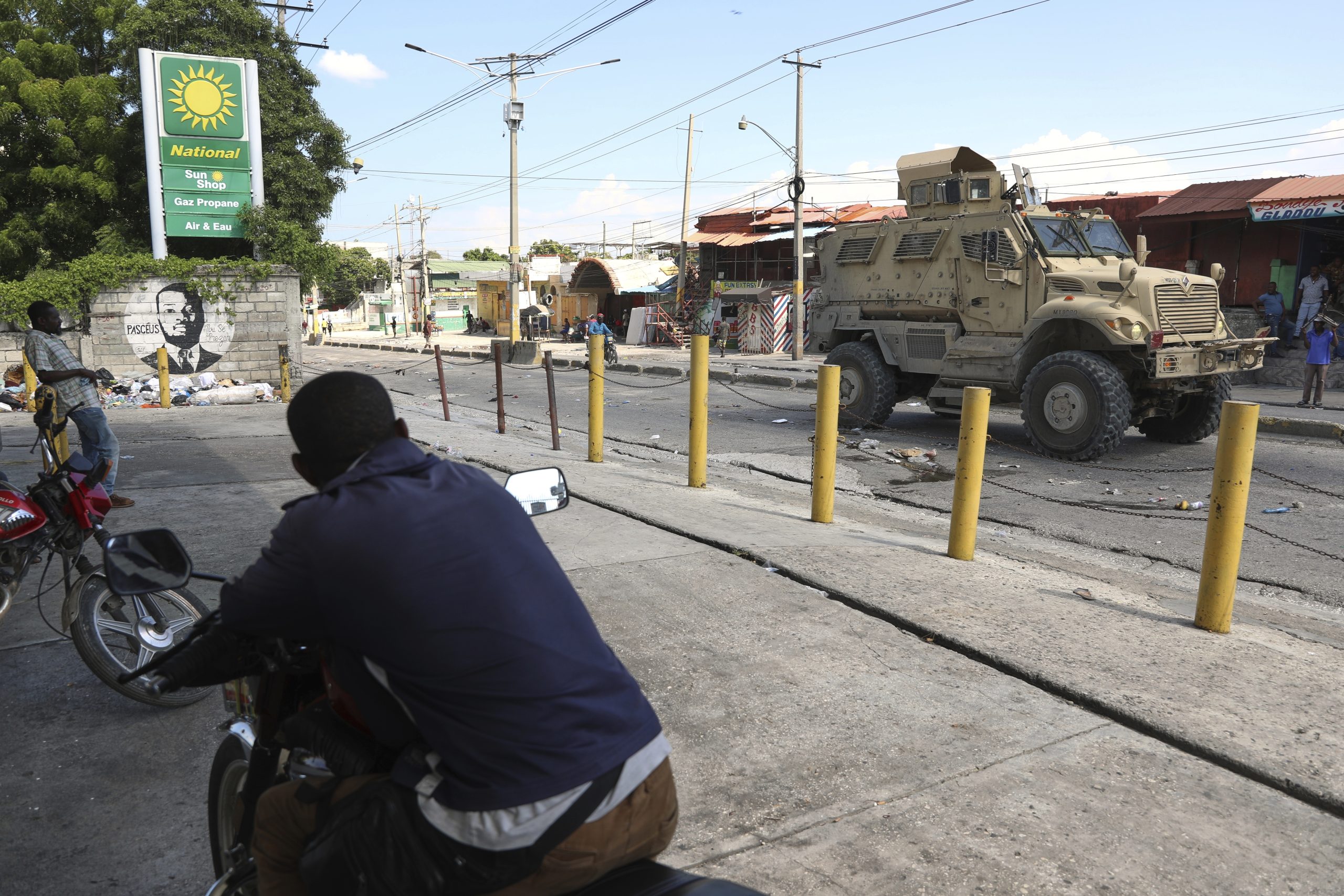 UN authorizes a much larger force to fight gangs in Haiti with new power to detain gang members