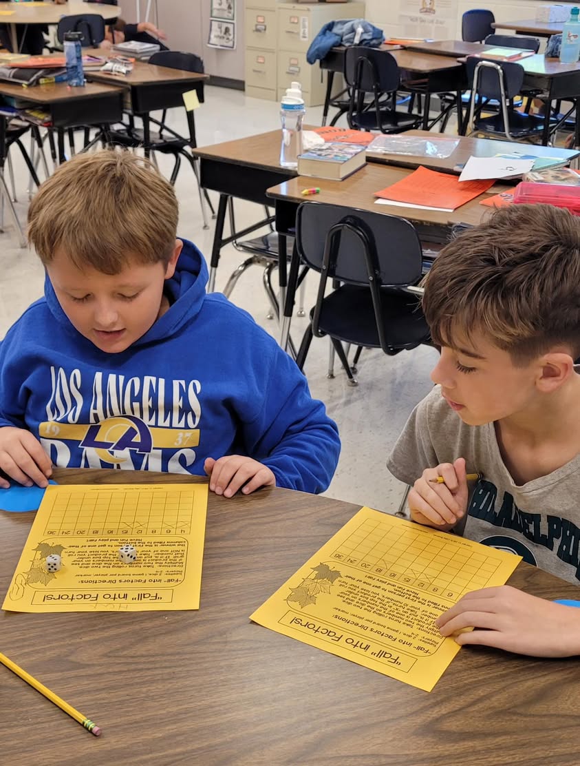 Mrs. Ruebush’s 4th grade class is “Falling Into Factors” today in math. #MAC185 #edisonbombers #4thgrade