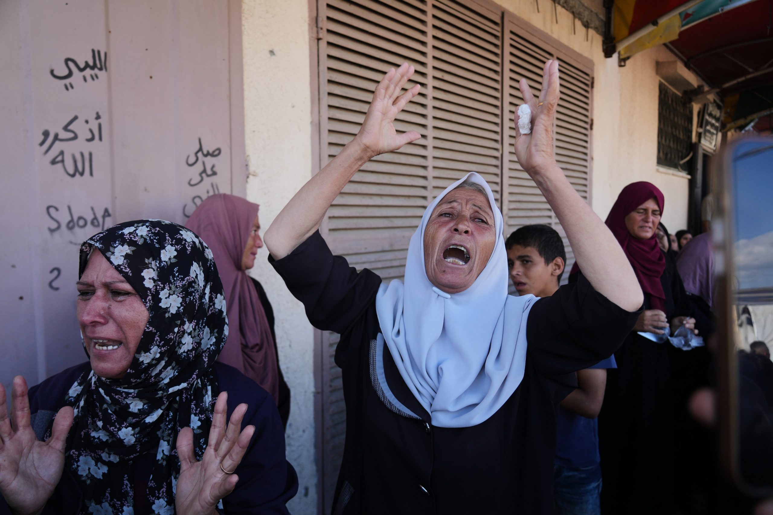 Israeli strikes in Gaza kill at least 16 as the world awaits Hamas’ response to Trump’s peace plan