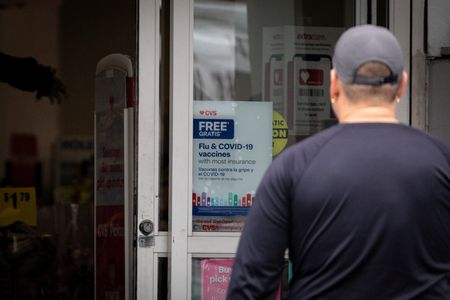 US CDC pulls broad support for COVID shot