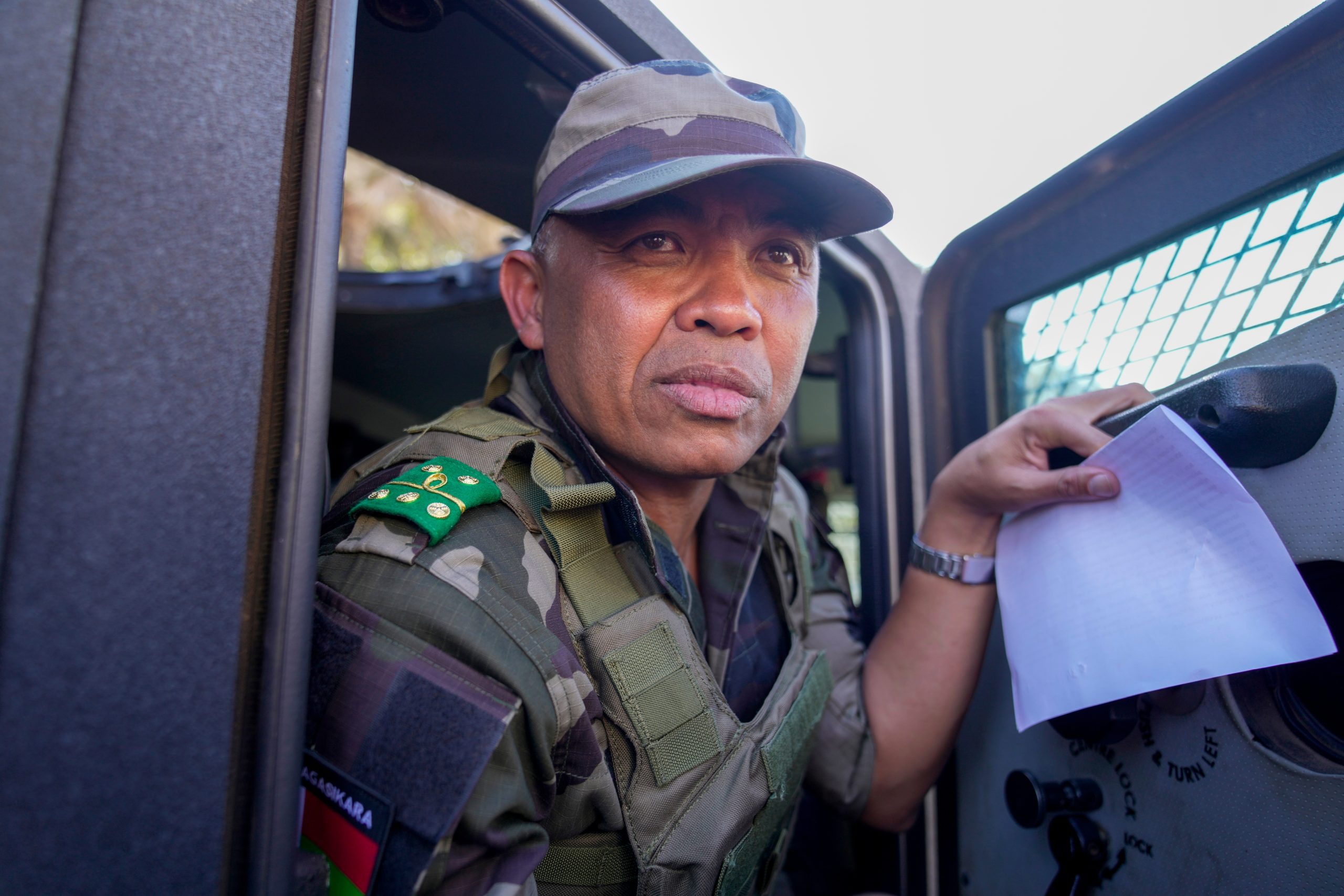 Photos of a colonel announcing military takeover in Madagascar after president flees