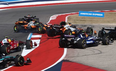Motor racing-McLarens collide in U.S. GP sprint, both out