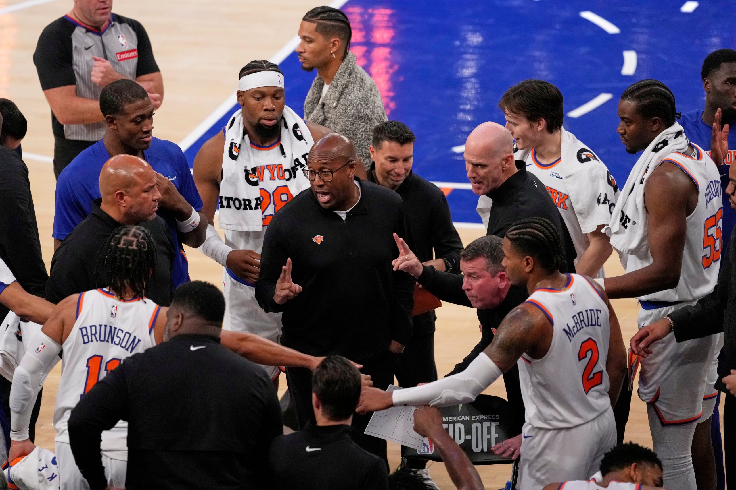 Mike Brown gets a win and a hug from Spike Lee in his first game as Knicks coach