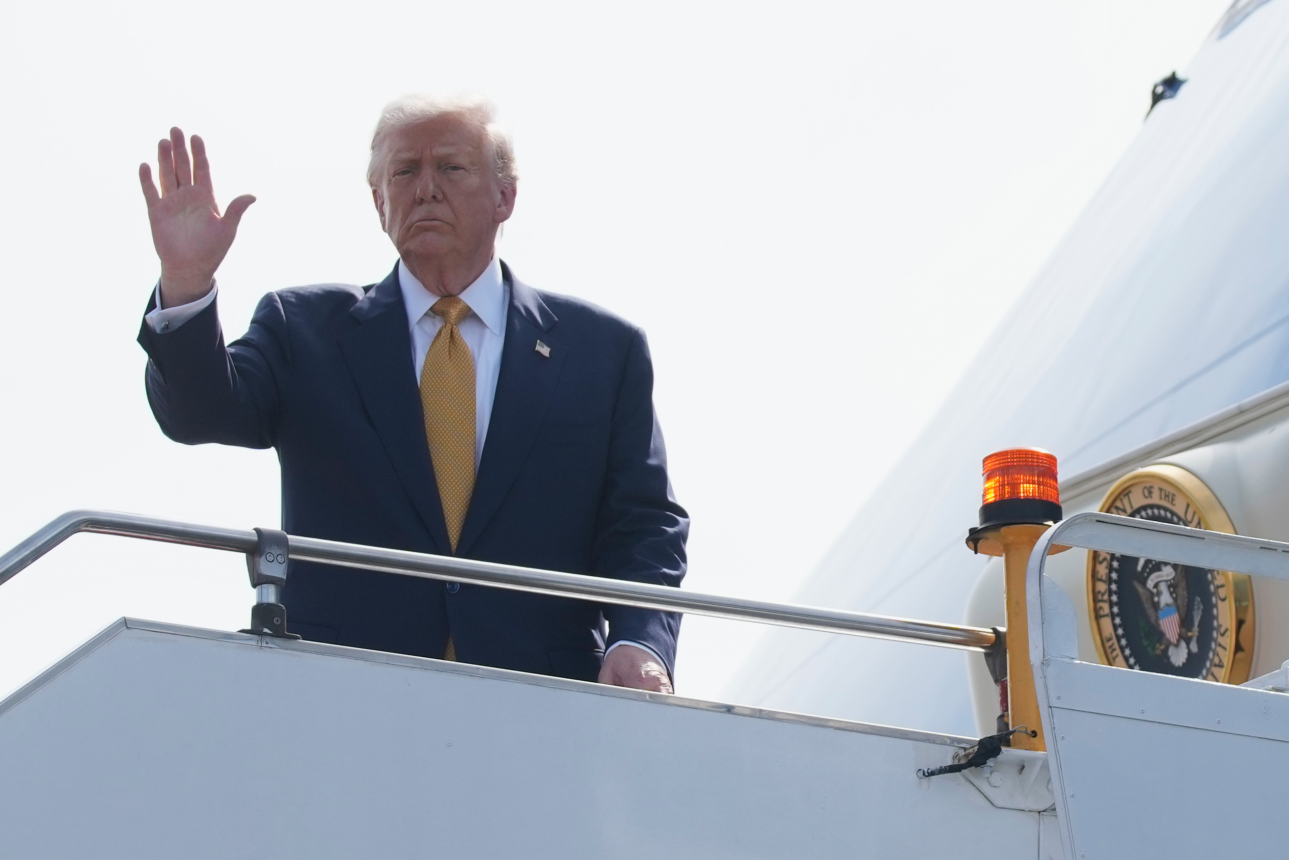 The Latest: Trump arrives in Japan, where he’ll meet new Prime Minister Takaichi