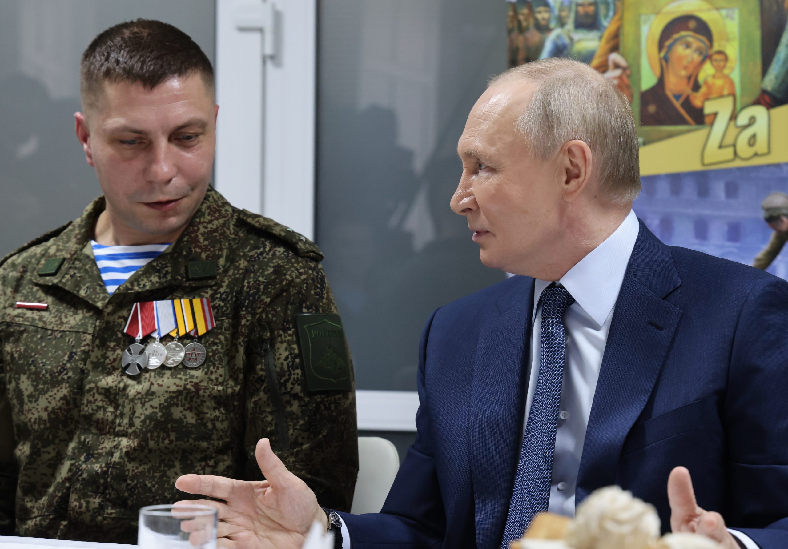 Putin claims Russian troops have surrounded 2 Ukrainian cities but Ukraine says that’s not true