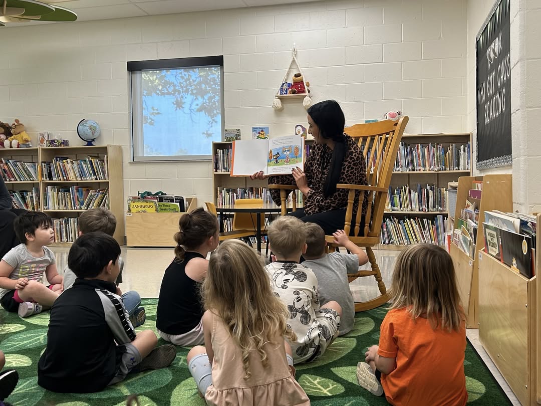 A big thank you to Darian Miller for being a guest reader during Mrs. James’ library time today! 🧡  #mac185