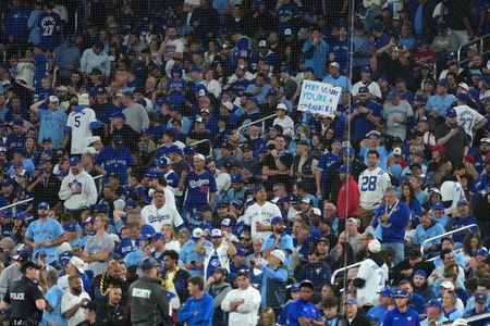 Father-son Blue Jays fans walk away winners from World Series Game 7