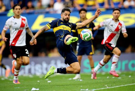 Soccer-Boca heap more misery on River with 2-0 Superclasico win