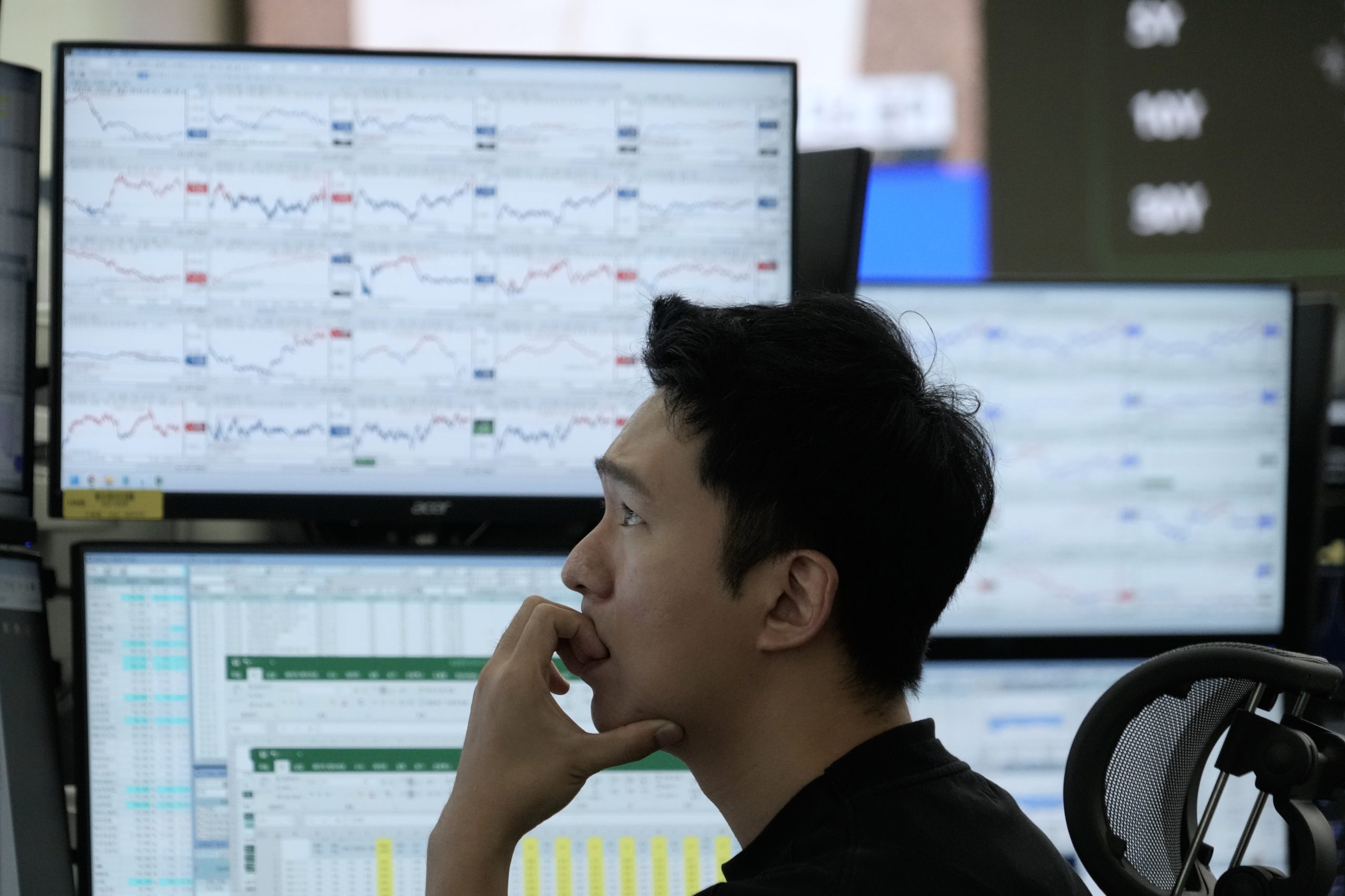 Asian shares fall, tracking Wall Street’s tumble on worries about AI stocks and interest rates