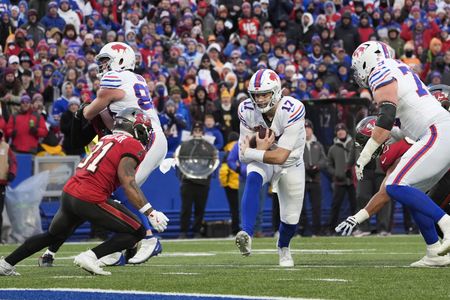 Josh Allen passes and rushes for 6 TD’s as Bills outslug Bucs