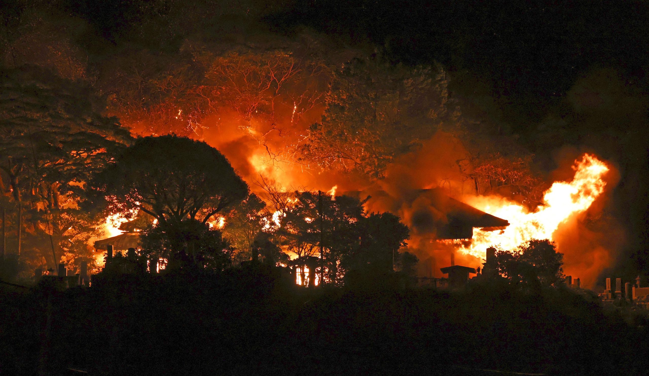 Fire burning in southwestern Japan damages 170 homes and forces evacuations