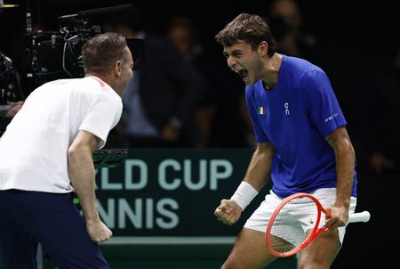 Tennis-Holders Italy ease past Austria to reach Davis Cup semi-finals