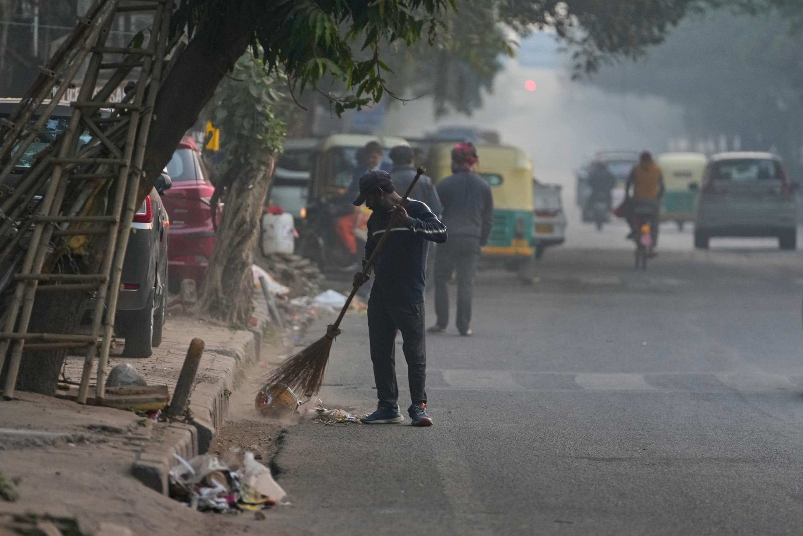 Photos show the daily struggle to breathe in New Delhi’s dense winter smog