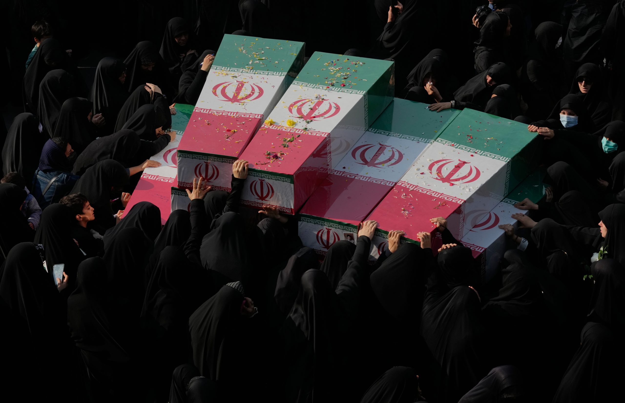 Photos show mourners in Tehran honoring the unknown soldiers killed in the 1980’s Iran-Iraq war