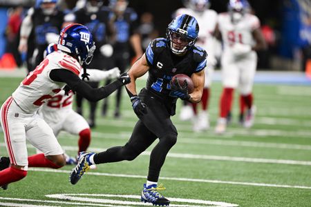 Lions WR Amon-Ra St. Brown exits with ankle injury