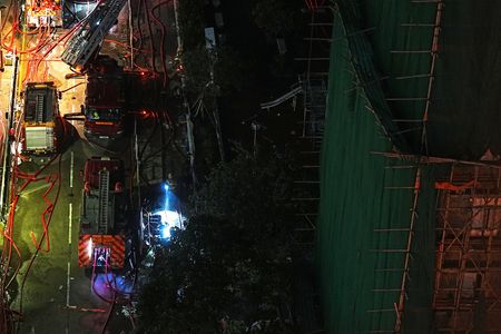 Anger simmers over Hong Kong deadly blaze as Beijing warns against “disruption”