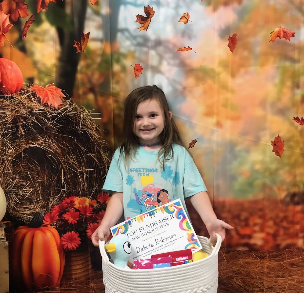 MacArthur Early Childhood Center gifted Dakota with a basket of goodies for being the top seller during our recent schoo…