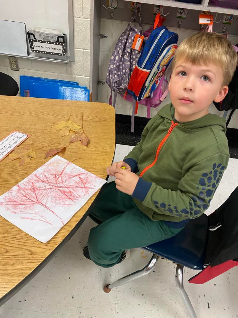 Mrs. Burnham’s kindergarten class took advantage of the beautiful fall weather.  They collected leaves and created leaf…