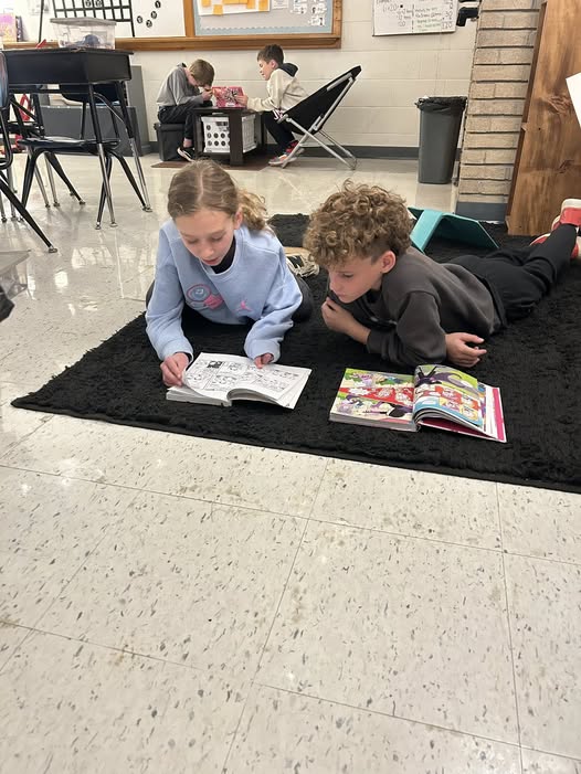 Today 3C was challenged to choose a reading partner that they do not normally hang out with or would like to know more a…