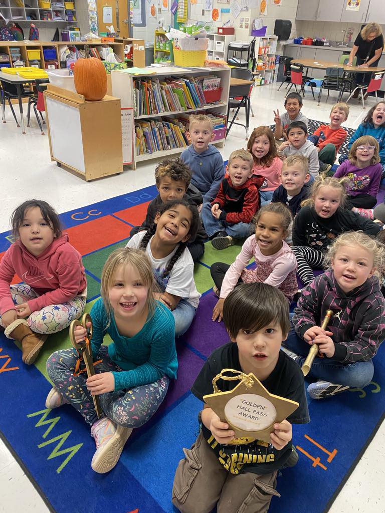 Mrs. Burnham’s kindergarten class proudly celebrates earning 3 Golden Awards!