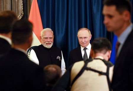 Russia’s Putin seeks to boost energy, defence exports with India visit