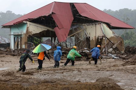 Death toll from Indonesia floods and landslides passes 700