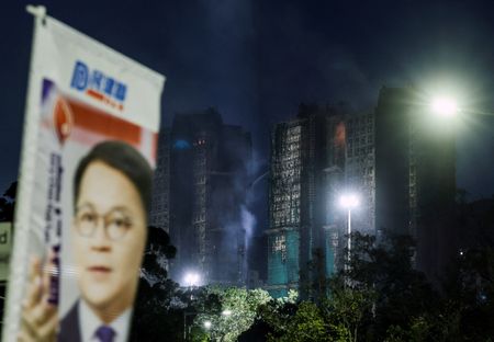 Hong Kong faces low election turnout as residents mourn deadly fire