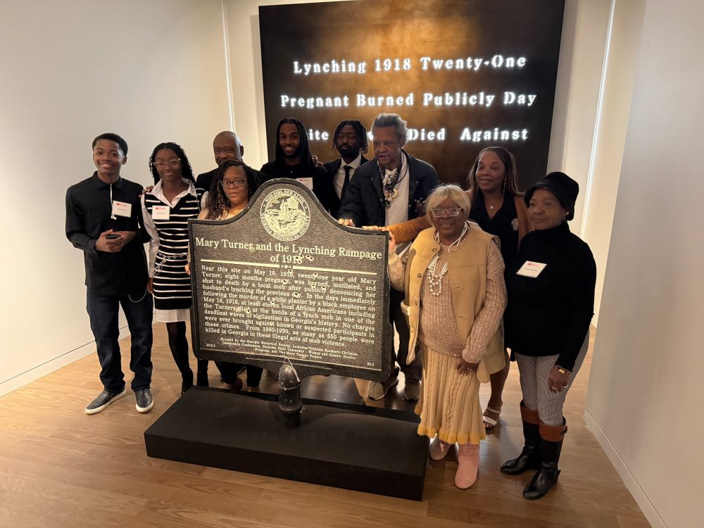 Bullet-pocked marker memorializing 1918 lynching goes on display in Atlanta